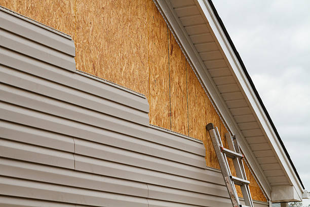 Professional Siding Replacement technician working in Brookville, IN